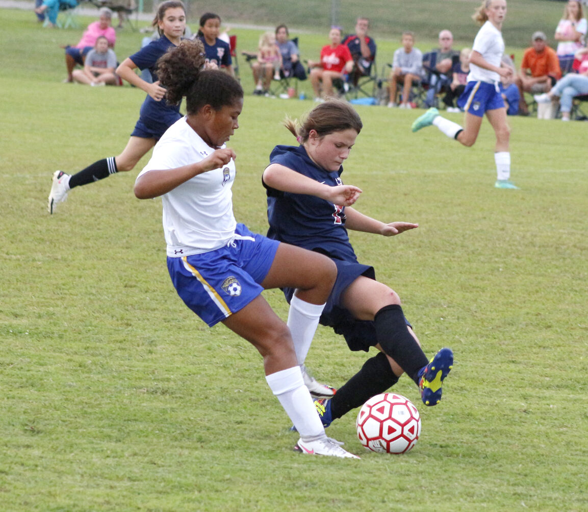 Gladwell challenges for the ball